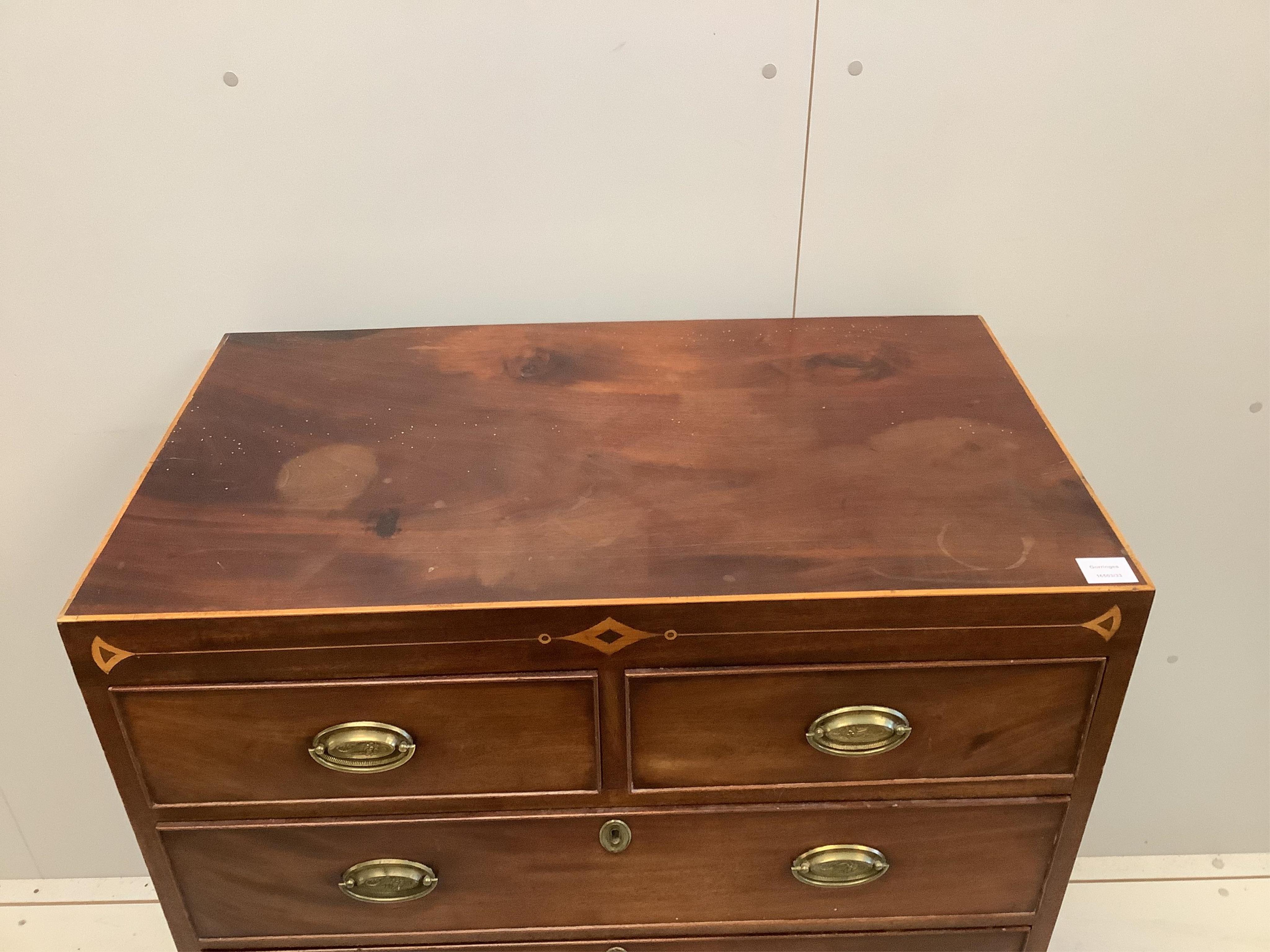 A Regency inlaid mahogany chest, width 87cm, depth 50cm, height 106cm. Condition - fair, top slightly faded, spot and ring marked.